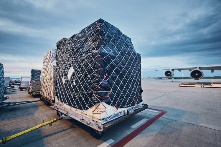 loading-cargo-to-airplane-e1607325256725.jpg